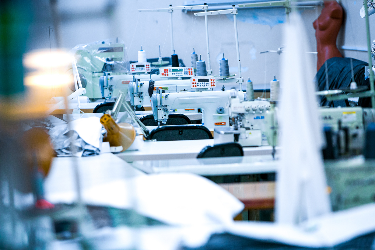 Equipment on the garment sewing factory. Manufacture of clothing and fabrics.